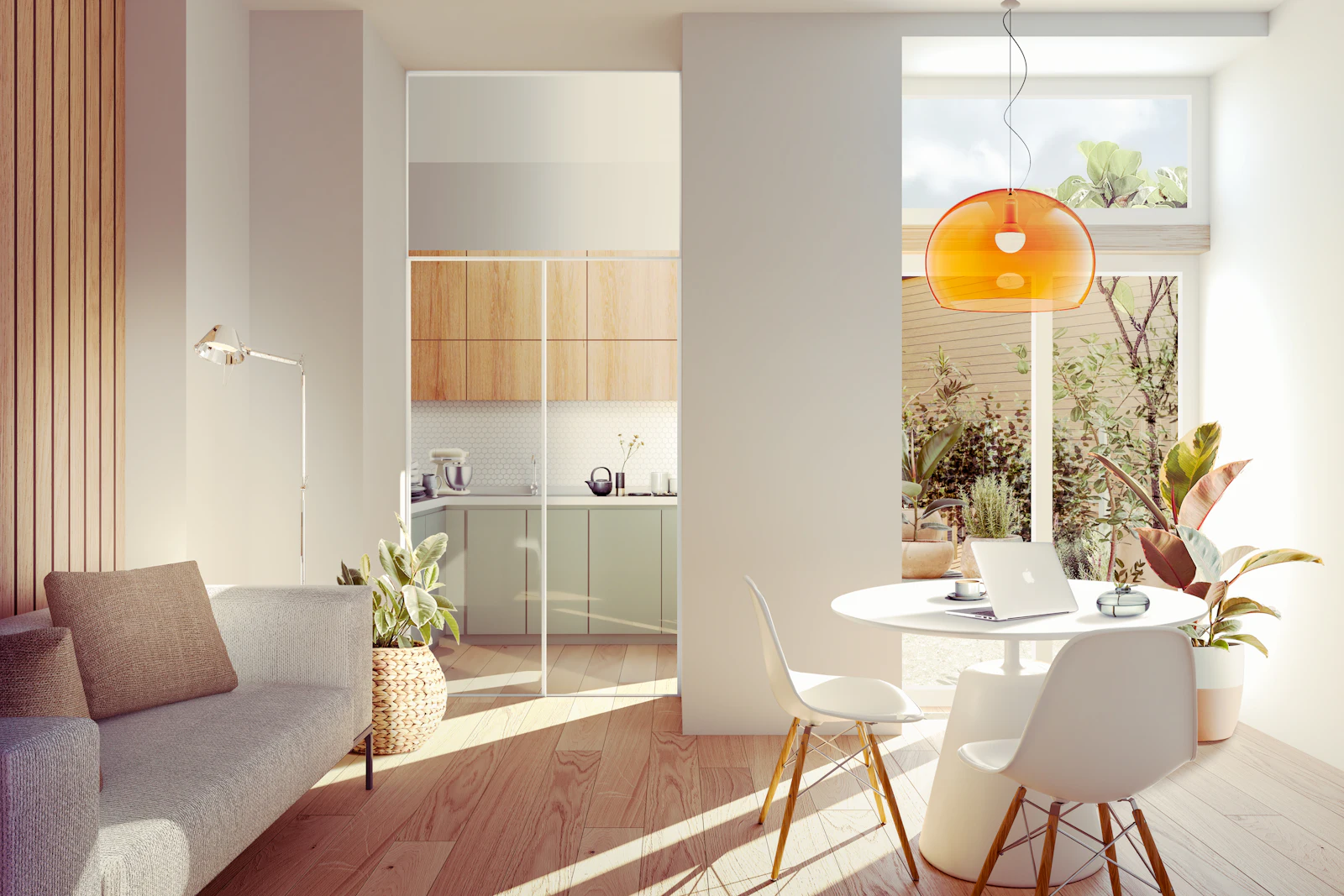 Sala de estar com sofá, mesa e cozinha integrada